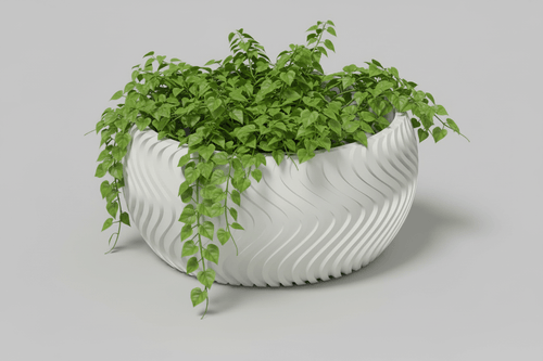 Curved planter for small plants featuring a modern design and lush greenery for a contemporary aesthetic.